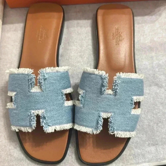 Hermes Shoes - HERMES ORAN FRINGED LIGHT DENIM SANDAL
-NEW FULL SET 
-NEVER WORN
SZ38